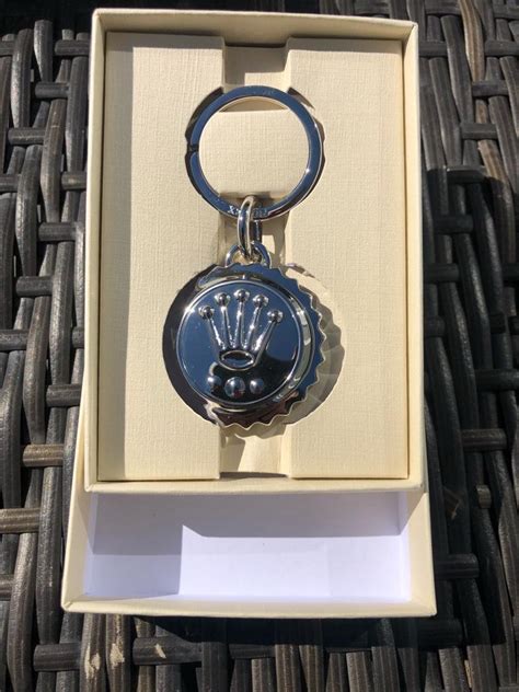 rolex key chains and ashtrays